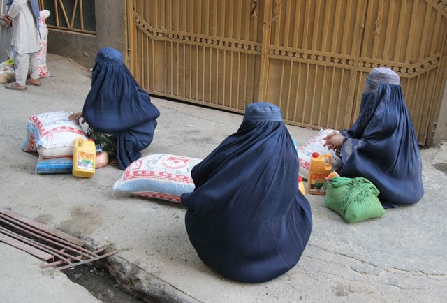 afghan women who were displaced during clashes between afghan forces and taliban insurgents receive food donations from a charity group in kunduz on october 14 2015 traumatised residents were slowly returning to kunduz october 14 after the taliban announced their formal withdrawal from the northern afghan city photo afp afghan women who were displaced during clashes between afghan forces and taliban insurgents receive food donations from a charity group in kunduz on october 14 2015 traumatised residents were slowly returning to kunduz october 14 after the taliban announced their formal withdrawal from the northern afghan city photo afp