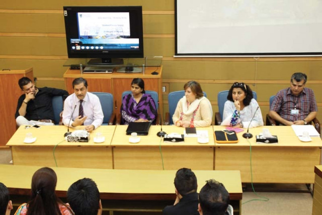 faculty and students at a panel discussion at imsciences photo saadan faculty and students at a panel discussion at imsciences photo saadan