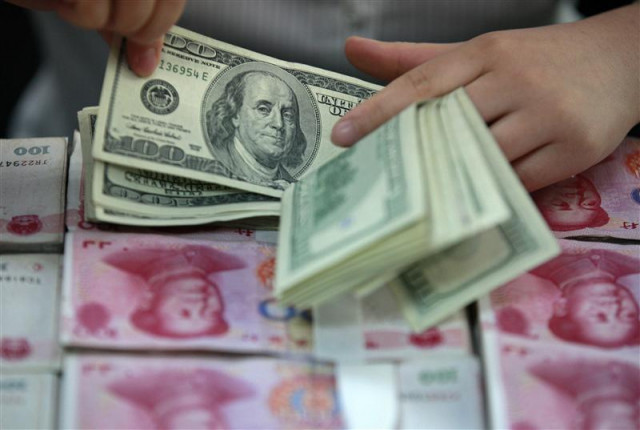 officials say foreign currency worth rs25m recovered photo reuters officials say foreign currency worth rs25m recovered photo reuters