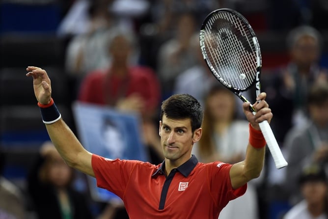 djokovic celebrates after defeating feliciano lopez on october 15 2015 photo afp