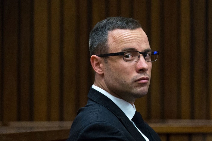 south african paralympic athlete oscar pistorius looking on during his trial at the high court in pretoria on may 13 2014 photo afp