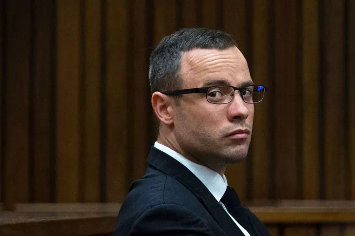 south african paralympic athlete oscar pistorius looking on during his trial at the high court in pretoria on may 13 2014 photo afp south african paralympic athlete oscar pistorius looking on during his trial at the high court in pretoria on may 13 2014 photo afp