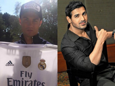 ronaldo wishes john abraham good luck with a signed jersey