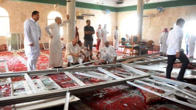 family members of victims and well wishers are seen after a suicide bomb attack at the imam ali mosque in the village of al qadeeh in the eastern province of gatif saudi arabia may 22 2015 photo reuters