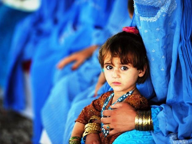 a photo showing afghan refugees in pakistan photo afp
