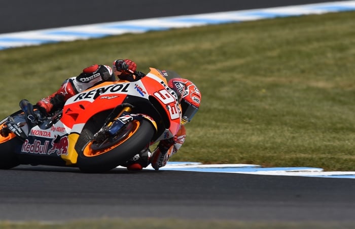 repsol honder rider marc marquez of spain powers through a corner during practice for the motogp australian grand prix on october 17 2015 photo afp