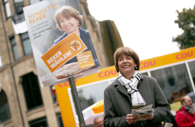 henriette reker l a prominent candidate for the mayoral election in cologne campaigning in cologne western germany reker suffered serious stab wounds to the neck during an assault on october 17 2015 in cologne german police said the stabbing of reker had a quot racist political quot motive linked to the huge numbers of migrants entering the country photo afp