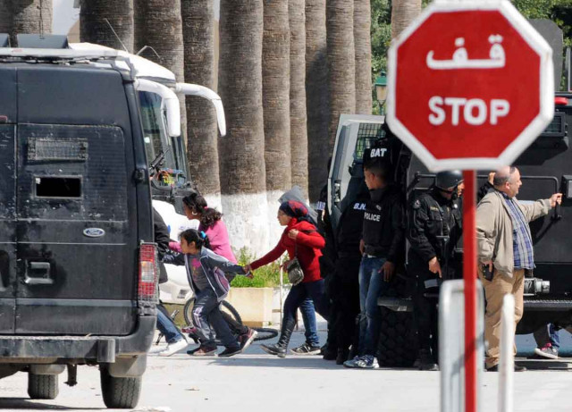 tourists are evacuated by special forces from the site of an attack carried out by two gunmen at tunis 039 famed bardo museum on march 18 2015 photo afp tourists are evacuated by special forces from the site of an attack carried out by two gunmen at tunis 039 famed bardo museum on march 18 2015 photo afp