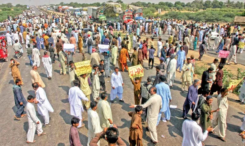 members of the palari community blocked both the sides of the super highway for 10 minutes on sunday they were protesting against the construction of the m 9 karachi hyderabad motorway as the residents and businesses along its route have been asked to vacate properties photo athar khan express members of the palari community blocked both the sides of the super highway for 10 minutes on sunday they were protesting against the construction of the m 9 karachi hyderabad motorway as the residents and businesses along its route have been asked to vacate properties photo athar khan express