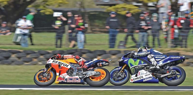 valentino rossi finished fourth and had his world championship lead cut to 11 points over teammate lorenzo with two races left photo afp valentino rossi finished fourth and had his world championship lead cut to 11 points over teammate lorenzo with two races left photo afp
