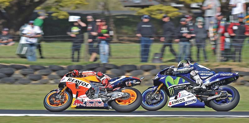 valentino rossi finished fourth and had his world championship lead cut to 11 points over teammate lorenzo with two races left photo afp