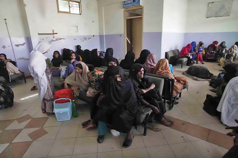 pilgrims from karachi wait at a bus terminus in quetta after they were stopped from travelling to iran photo online