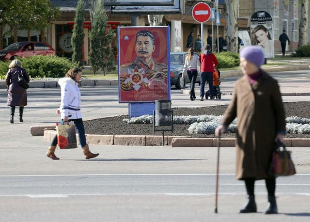 a portrait of soviet dictator josef stalin is seen displayed on an advertisement board in donetsk the rebel capital of eastern ukraine photo afp a portrait of soviet dictator josef stalin is seen displayed on an advertisement board in donetsk the rebel capital of eastern ukraine photo afp