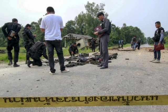 miilitary personnel and forensic experts inspect the site where soldiers were attacked by suspected militants at sai buri district in the troubled southern province of pattani thailand october 19 2015 photo reuters miilitary personnel and forensic experts inspect the site where soldiers were attacked by suspected militants at sai buri district in the troubled southern province of pattani thailand october 19 2015 photo reuters