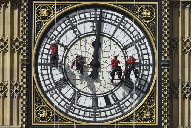 cleaners abseil down one of the faces of big ben to clean and polish the clock face above the houses of parliament in central london in this file picture taken august 19 2014 photo reuters cleaners abseil down one of the faces of big ben to clean and polish the clock face above the houses of parliament in central london in this file picture taken august 19 2014 photo reuters
