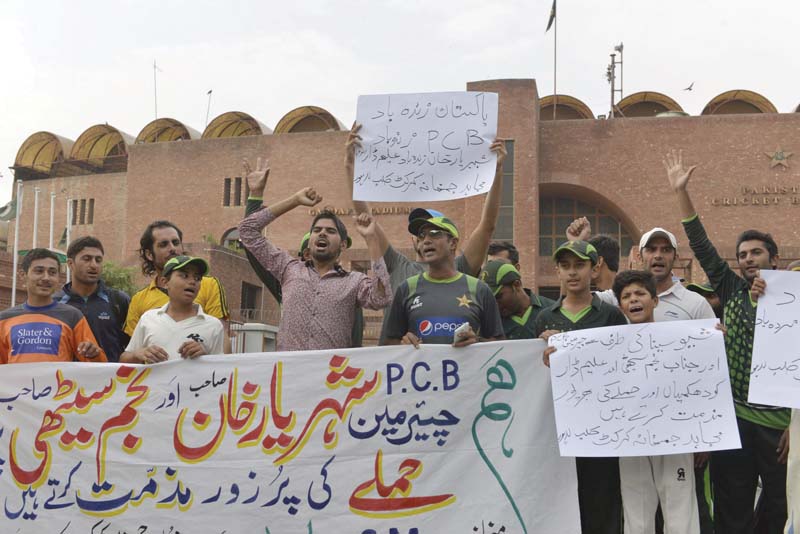 fans gather outside the pcb headquarters at gaddafi stadium in lahore to show their support of the board photo afp