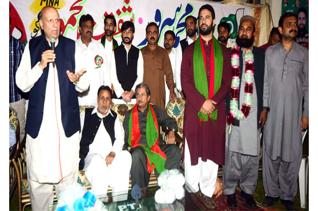 pakistan tehreek i insaf pti provincial organiser chaudhry sarwar addressing a corner meeting photo express