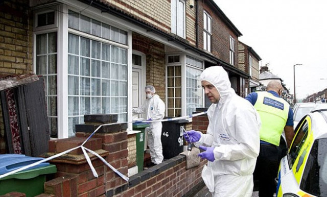 forensic officers at the family home in watford photo south beds news agency forensic officers at the family home in watford photo south beds news agency
