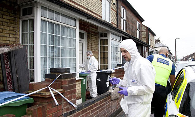 forensic officers at the family home in watford photo south beds news agency