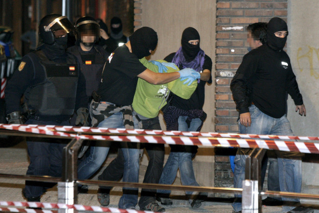 file photo of spanish police arresting a suspect photo epa file photo of spanish police arresting a suspect photo epa