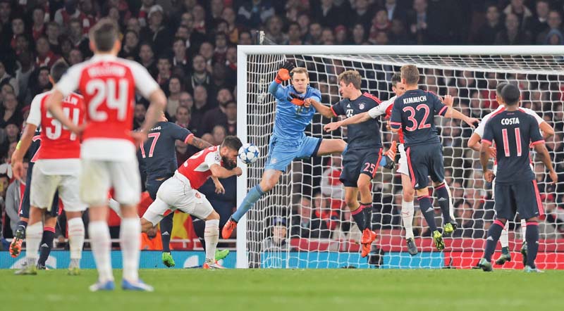 giroud kept arsenal s champions league campaign alive as the france striker punished a costly blunder from bayern munich goalkeeper neuer to inspire a crucial 2 0 win on tuesday photo reuters