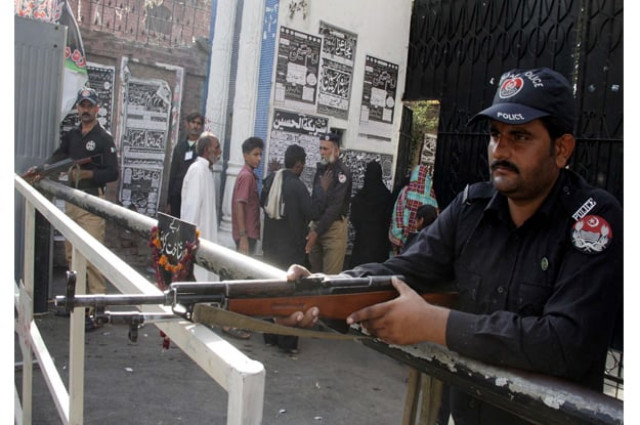 security officials stand alert to avoid untoward incident as security has been tightened during the holy month of muharram photo ppi security officials stand alert to avoid untoward incident as security has been tightened during the holy month of muharram photo ppi