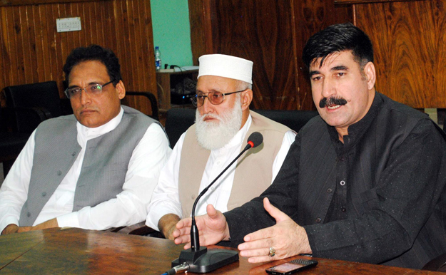 pakistan peoples party former mna from bajaur agency syed akhunzada chattan doing the press conference photo online