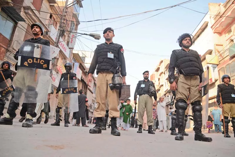 police stand vigilant near najab ali shah imambargah in qissa khwani photo express police stand vigilant near najab ali shah imambargah in qissa khwani photo express
