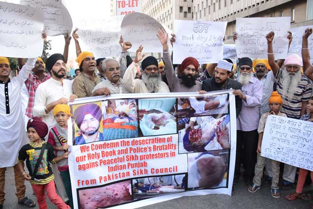 members of sikh community protesting at karachi press club against desecration of their holy book in lahore on october 18 2015 photo express mohammad azeem