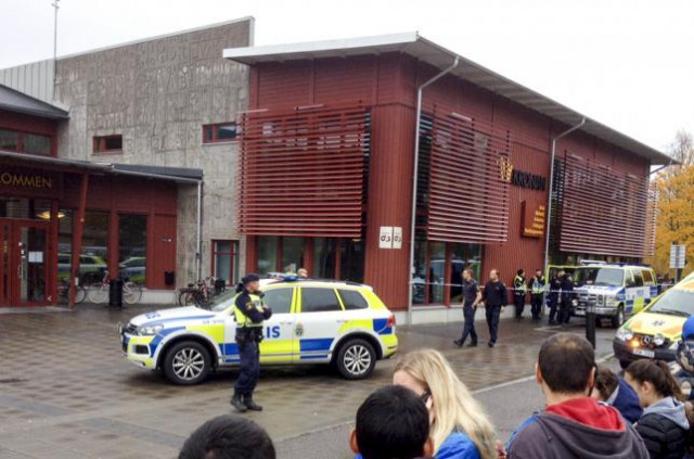 police cordon an area after a masked man attacked people with a sword at a school in trollhattan western sweden october 22 2015 photo reuters police cordon an area after a masked man attacked people with a sword at a school in trollhattan western sweden october 22 2015 photo reuters