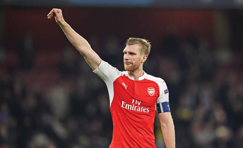 mertesacker was the captain of the night for arsenal against bayern and organised the defence well to help his side claim a clean sheet along with the win photo reuters