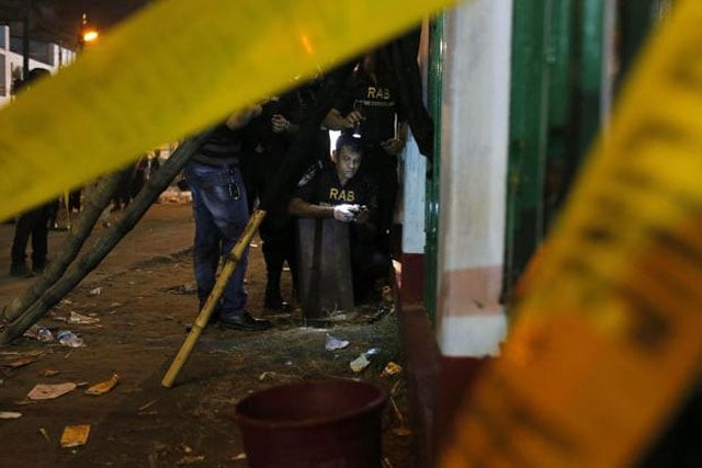 bangladeshi bomb disposal unit from rapid action battalion defuse an unexploded bomb at the site of an explosion in dhaka bangladesh on saturday photo ap