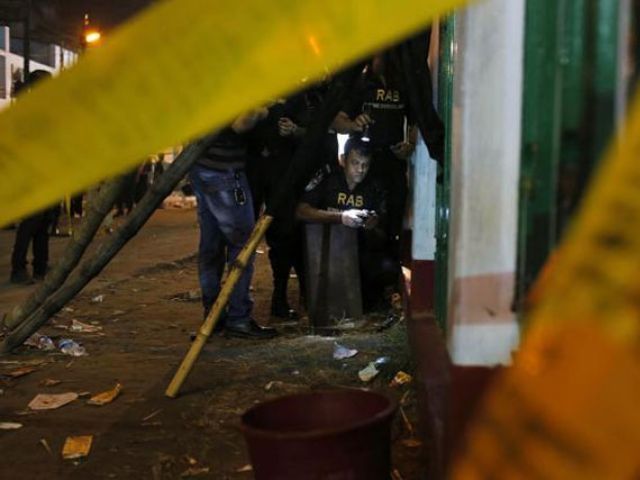 bangladeshi bomb disposal unit from rapid action battalion defuse an unexploded bomb at the site of an explosion in dhaka bangladesh on saturday photo ap