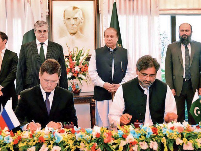 petroleum minister shahid khaqan abbasiand russian energy minister alexander novak sign the agreement for a gas pipeline project in islamabad photo pid