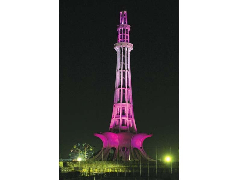 the minar is illuminated with pink lights photo ayesha mir express