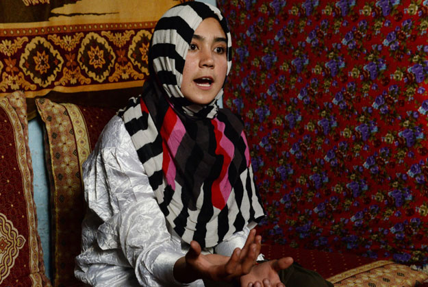 in this photograph taken on october 15 2015 14 year old afghan girl aziza rahimzada who has been nominated for the international children 039 s peace prize speaks with afp during an interview at her temporary home in kabul photo afp