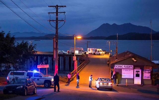 rescue personnel mounting a search for victims of a capsized whale watching boat park on a wharf in tofino british columbia october 25 2015 photo reuters