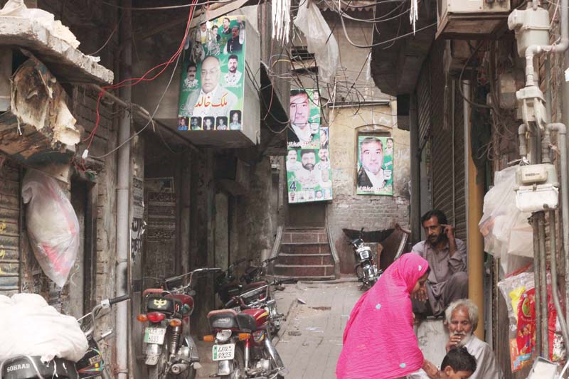 new anarkali is plastered with banners and posters of candidates contesting the local government elections photo shafiq malik express