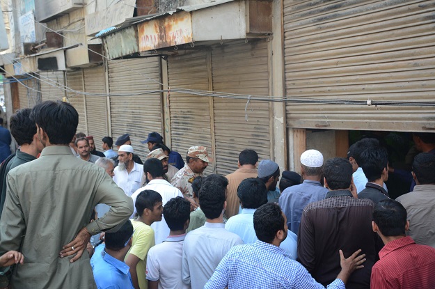 shopkeepers traders hold protest demanding police action against the culprits photo express