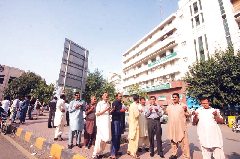 employees at various offices on the mall rushed on to the street and prayed for the safety of their loved ones photo abid nawaz express