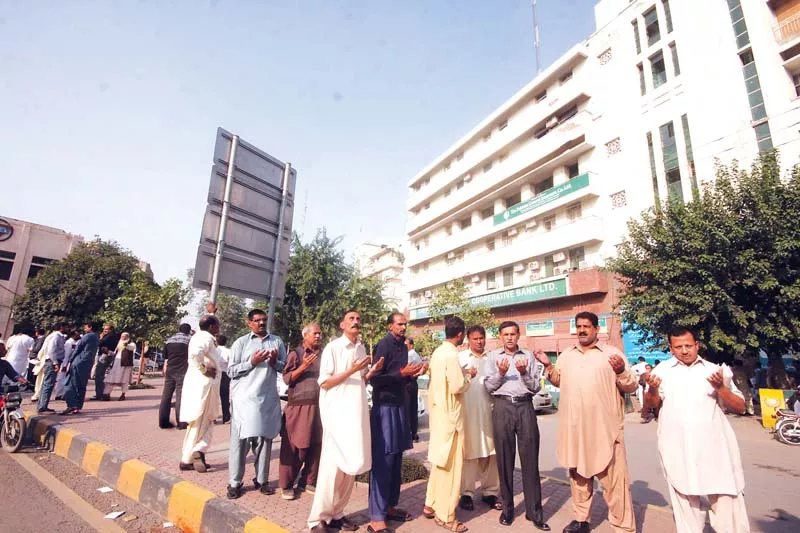 employees at various offices on the mall rushed on to the street and prayed for the safety of their loved ones photo abid nawaz express employees at various offices on the mall rushed on to the street and prayed for the safety of their loved ones photo abid nawaz express