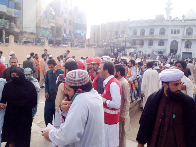 rescue workers and locals at lrh seen trying to contact people as city cell services were suspended photo umer farooq express