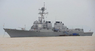 china slams us warship sail by near artificial islands