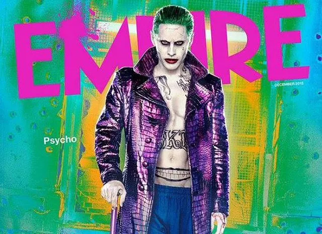 the joker sports a crocodile skin overcoat and wields a walking stick photo acesshowbiz