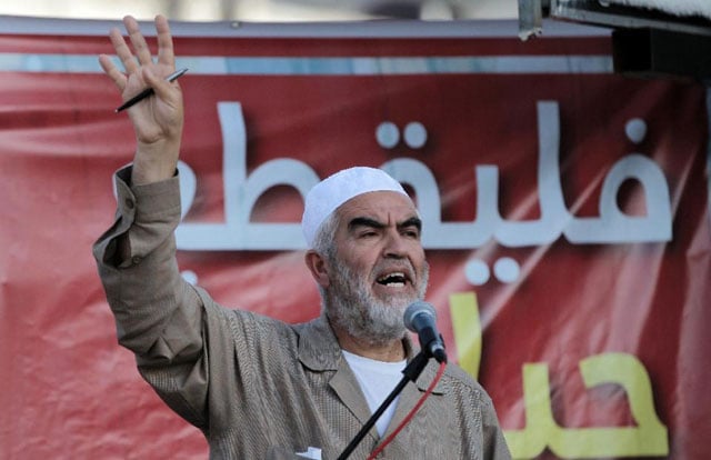 leader of the radical northern wing of the islamic movement in israel sheikh raed salah speaks at a demonstration in the town of kfar kana northern israel in may 2015 photo afp