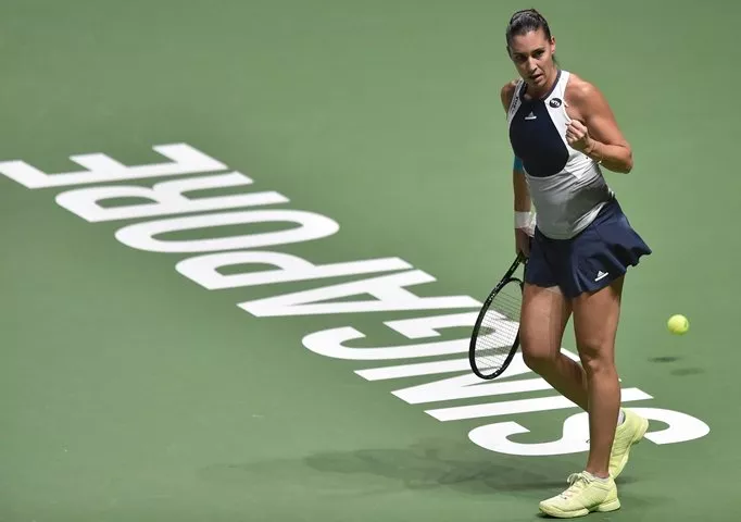 flavia pennetta reacts after a point against agnieszka radwanska during their women 039 s singles round robin match at the wta finals in singapore on octopber 27 2015 photo afp flavia pennetta reacts after a point against agnieszka radwanska during their women 039 s singles round robin match at the wta finals in singapore on octopber 27 2015 photo afp
