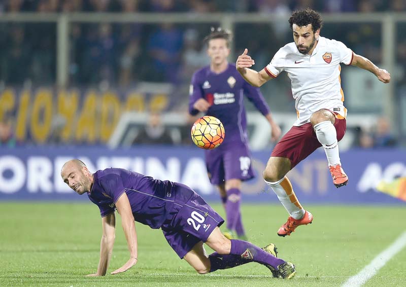 goals from mohamed salah and gervinho in a 2 1 win over fiorentina at the weekend saw roma top the serie a table for the first time this season photo afp