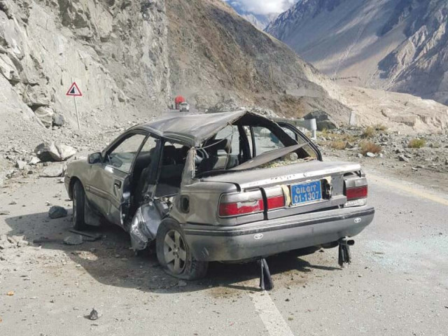car hit by boulders in kohistan photo express car hit by boulders in kohistan photo express