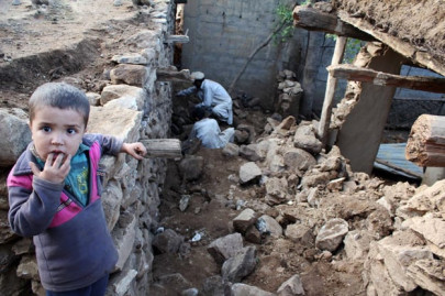 a family in torghar reels from aftershock