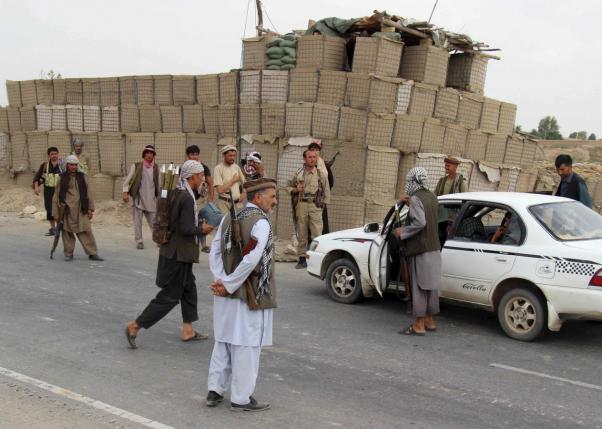 afghan local police alp keep watch at a checkpoint at chardara district in kunduz province afghanistan june 23 2015 photo reuters